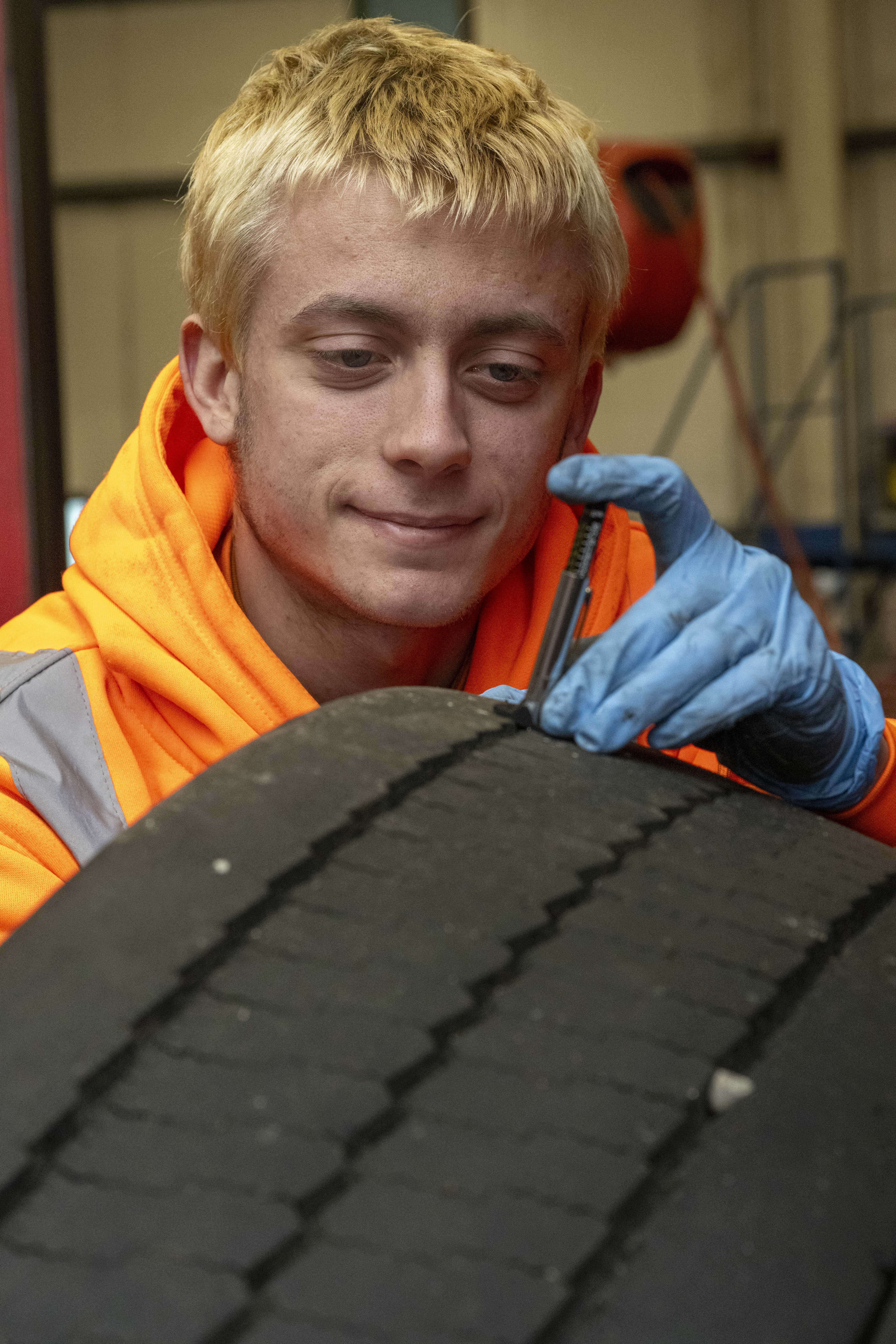 Zack checking tyre pressure